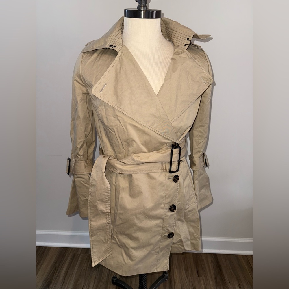 Tan Banana Republic trench coat.